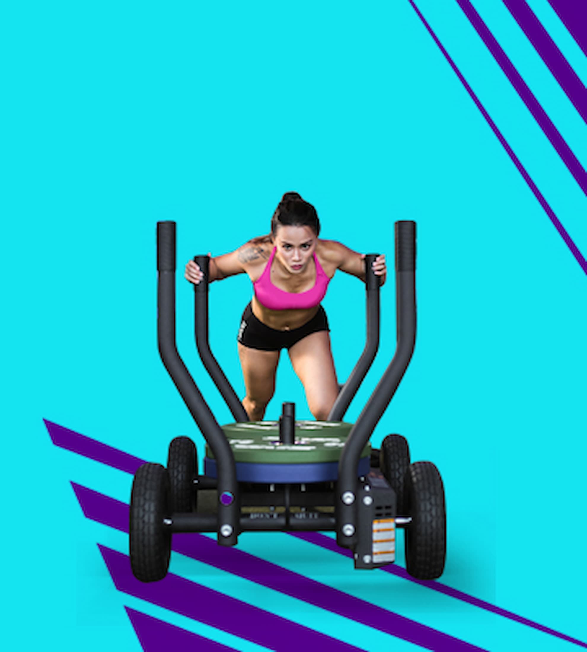 Girl performing a sled push.